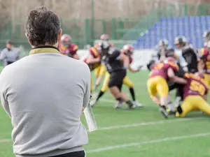 Beloved Football Coach Assassinated on Campus