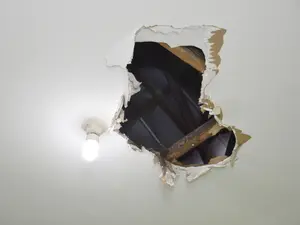 Fugitive Murder Suspect Falls Through Ceiling and Into Hands of US Marshals
