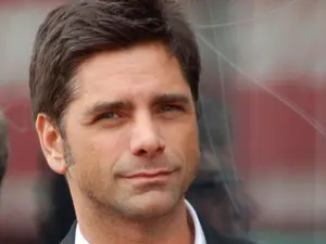 John Stamos Goes Nude for Glen Powell's Birthday