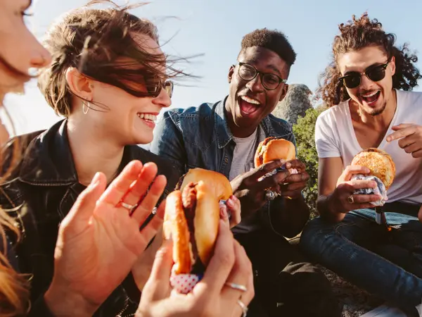eating burgers