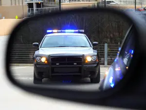 Why Was a Man's Body Found in the Passenger Seat During a Routine Traffic Stop?
